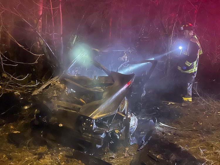 A bystander rescued a driver from a burning vehicle after a crash on I-205 near Padden Parkway before emergency crews arrived.