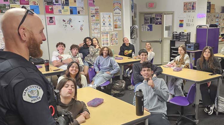 Sean Donaldson of the Vancouver Police Department talks to students at Heritage High School regarding the dangers of distracted driving as part of the Target Zero campaign. Photo by Paul Valencia