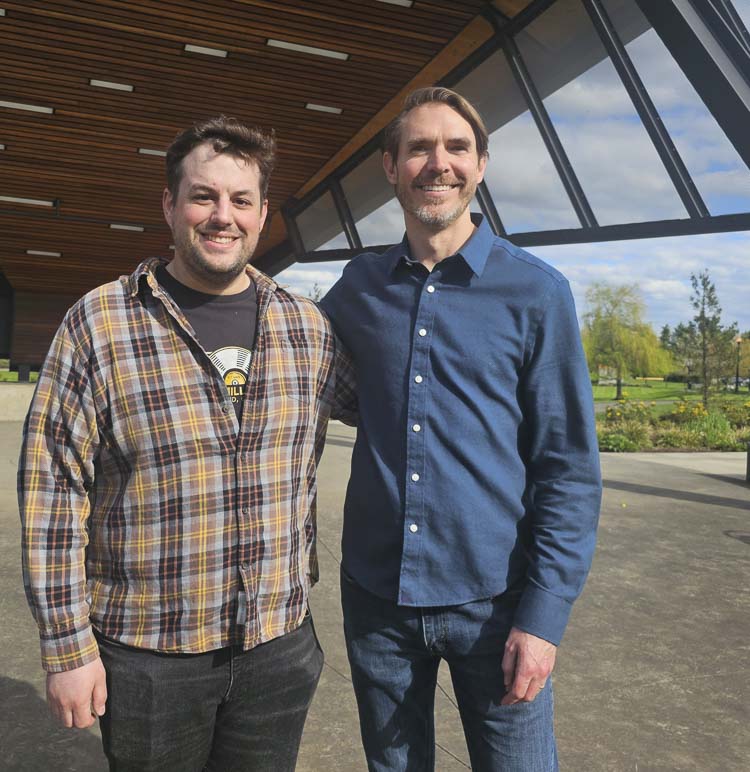 Clark County Battle of the Bands organizers Ryan Messling, left, and Owen Kortz stand at the amphitheater at the Columbia Tech Center Nature Park in east Vancouver, where the competition will take place on May 31. Photo by Paul Valencia
