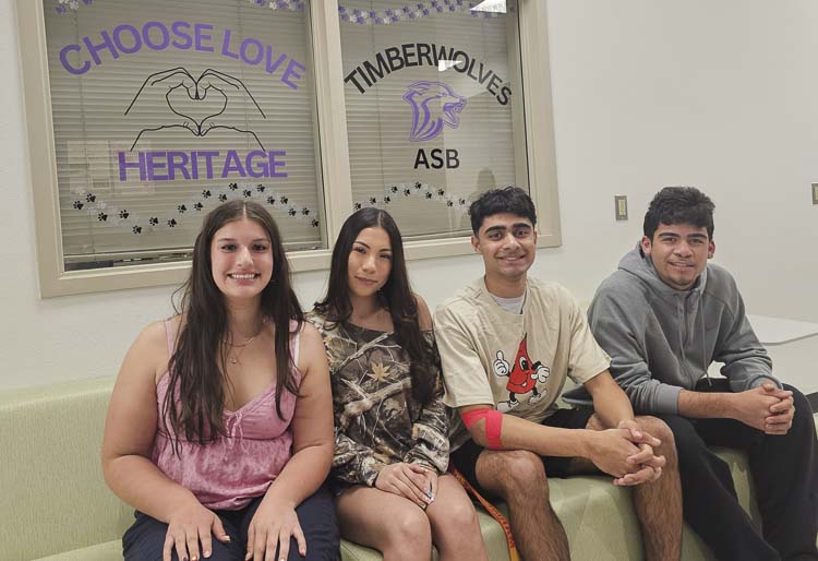Heritage High School ASB members Loreli Medina, Camila Herrera-Malvaez, Suhayb Quddus, and Omar Ramirez said they will continue the discussion about distracted driving with their friends. They had just been in a discussion with a Vancouver police officer regarding the dangers of distracted driving. Photo by Paul Valencia